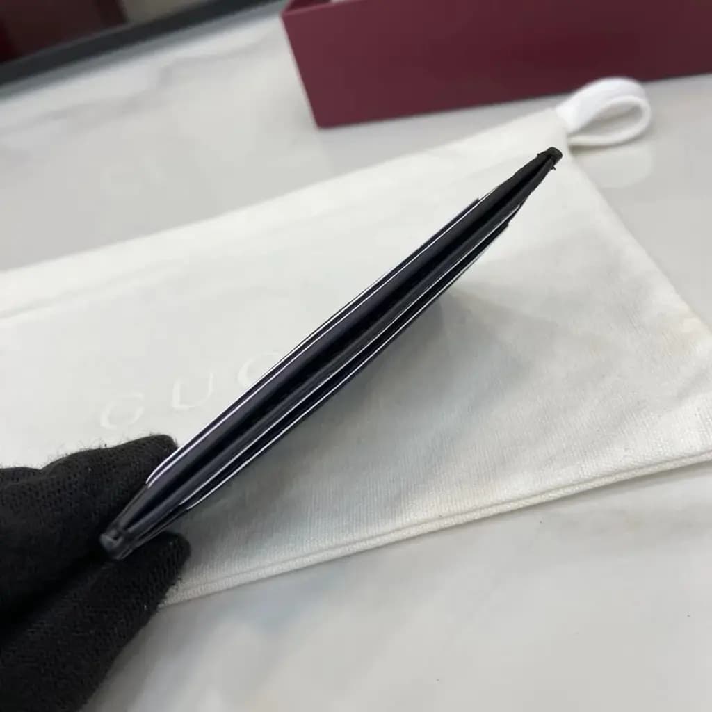 구찌 구찌 블랙 GG 레더 임프린트 카드 홀더 상세 이미지
