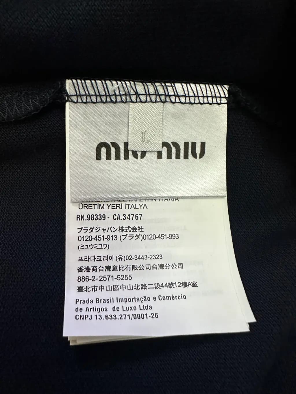 미우미우 미우미우 체크 칼라 포인트 피케 폴로 티셔츠 상세 이미지